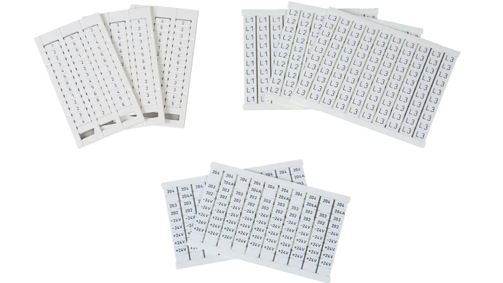 Printed terminal marker cards with numbers and labels such as L1, L2, L3 and +24V